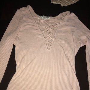 Long sleeved crossed front pink shirt